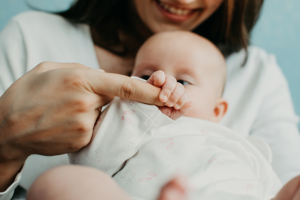 Mental Health in Postpartum Time. Maternal Mental Health. How to avoid pregnancy And Postpartum Disorders, postpartum baby blues, depression. Portrait of happy mother and newborn baby